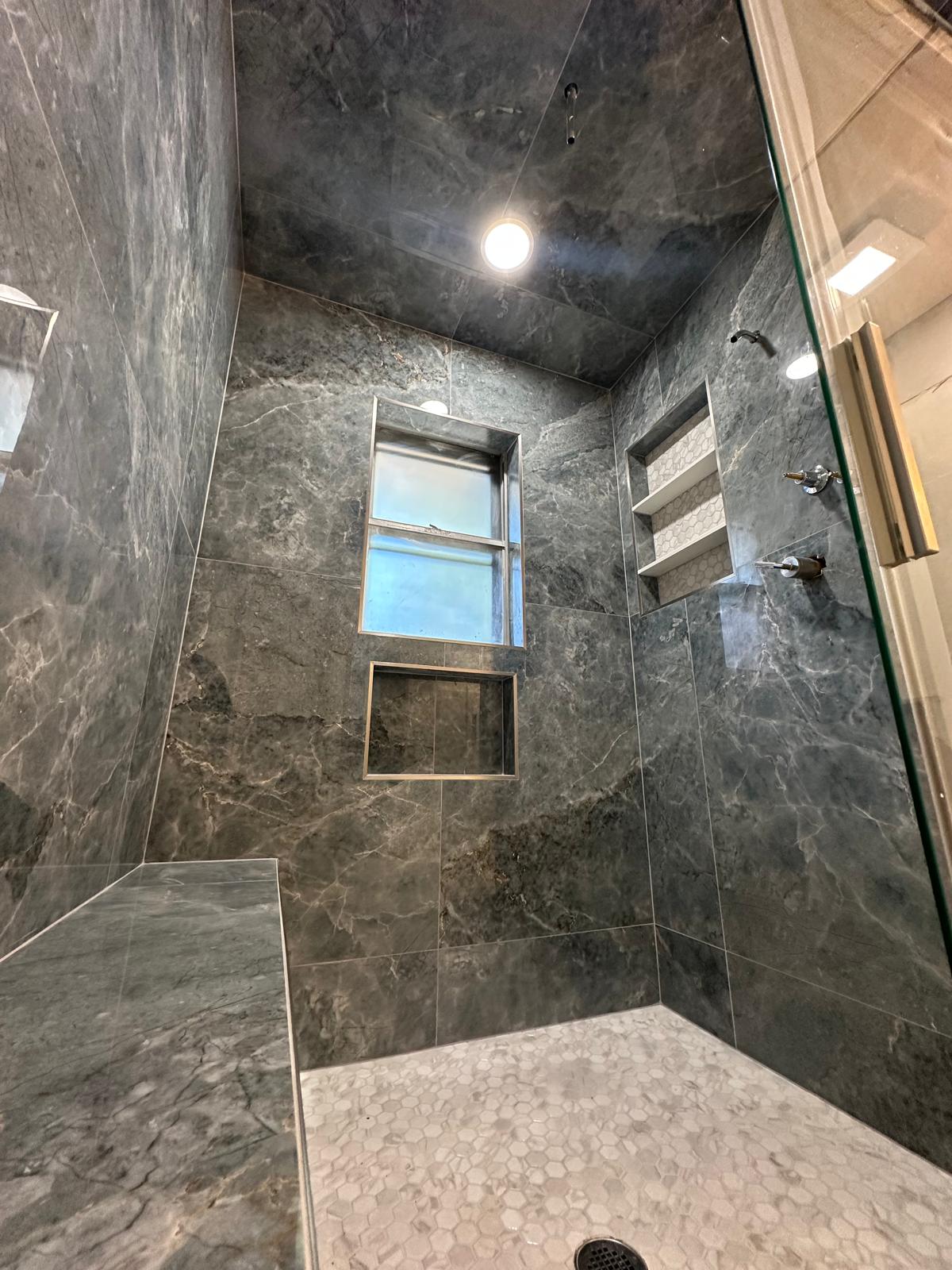 Completed tub-to-shower and walk-in shower project view 16